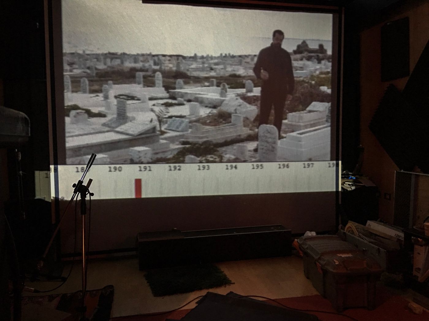 Recording session: microphone in front of the projected picture