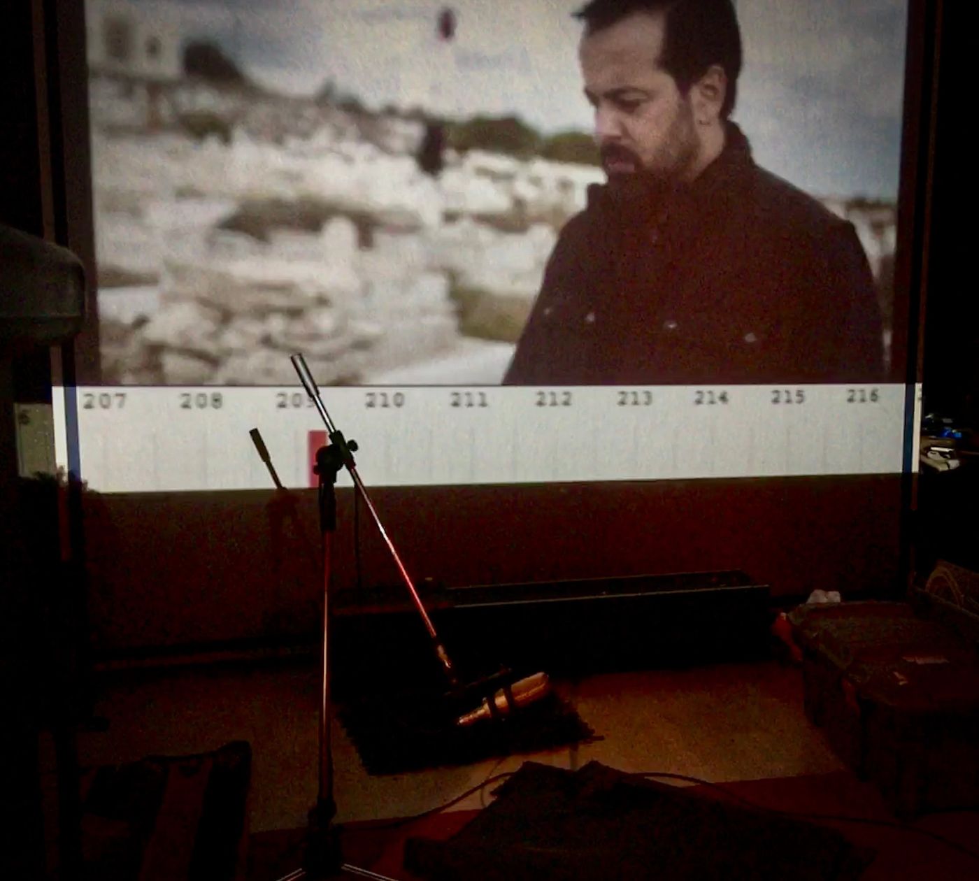 Recording session: microphone in front of the projected picture
