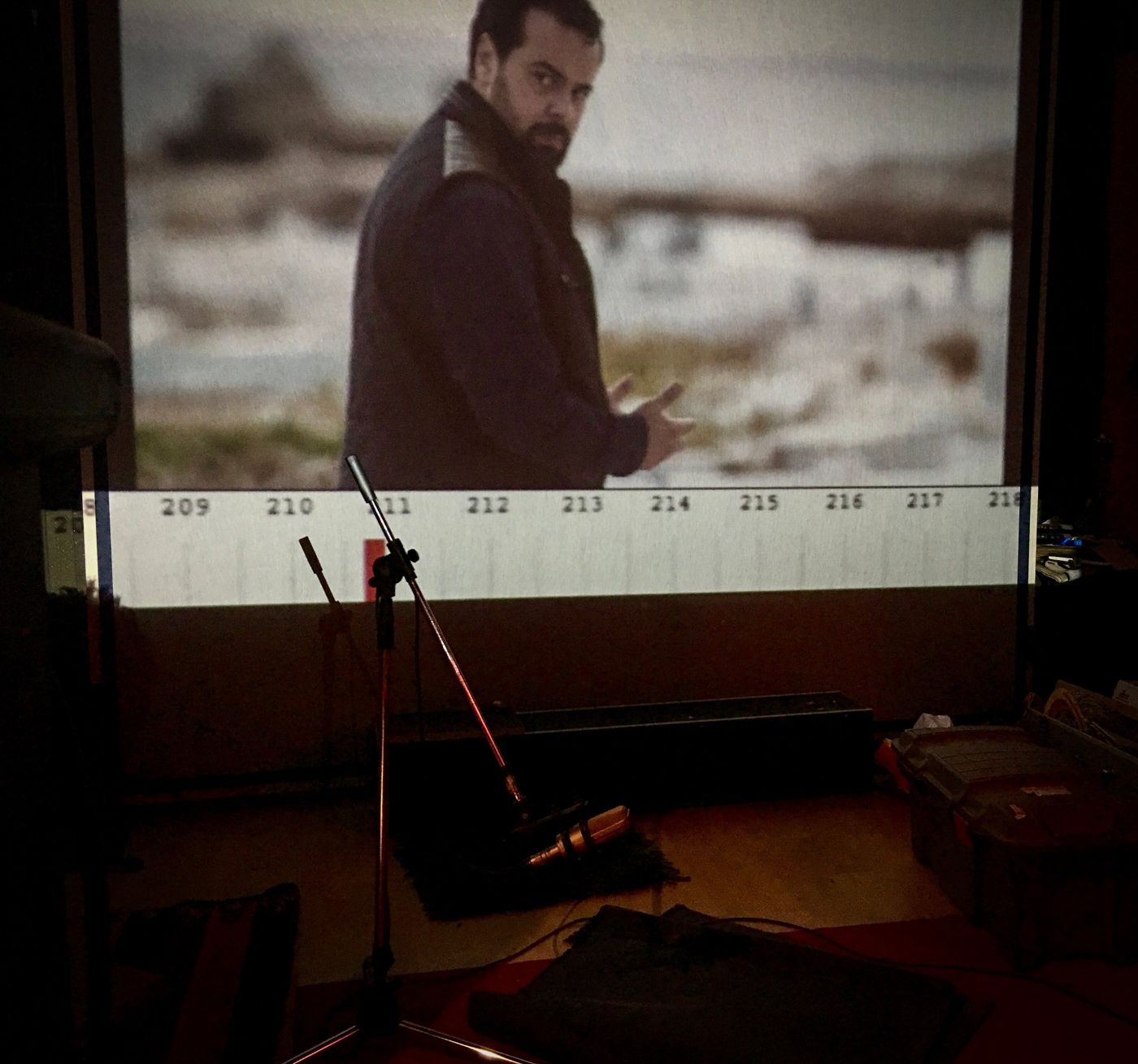 Recording session: microphone in front of the projected picture
